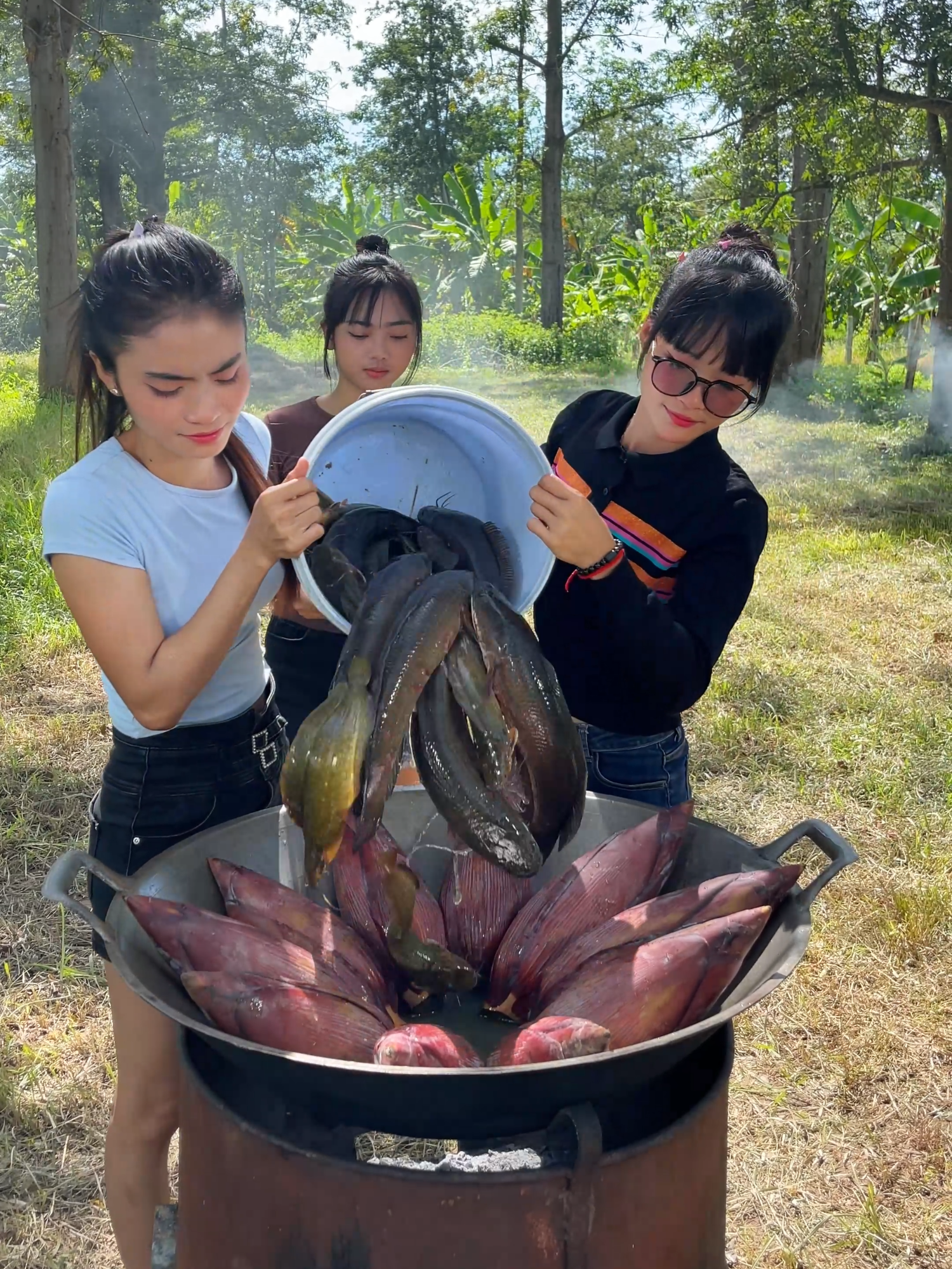 Cooking deep fried fish and making banana flower salad recipe