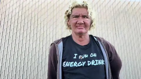 Angela’s hair is matted. Watch the full interview at Lost in Phoenix on YouTube 