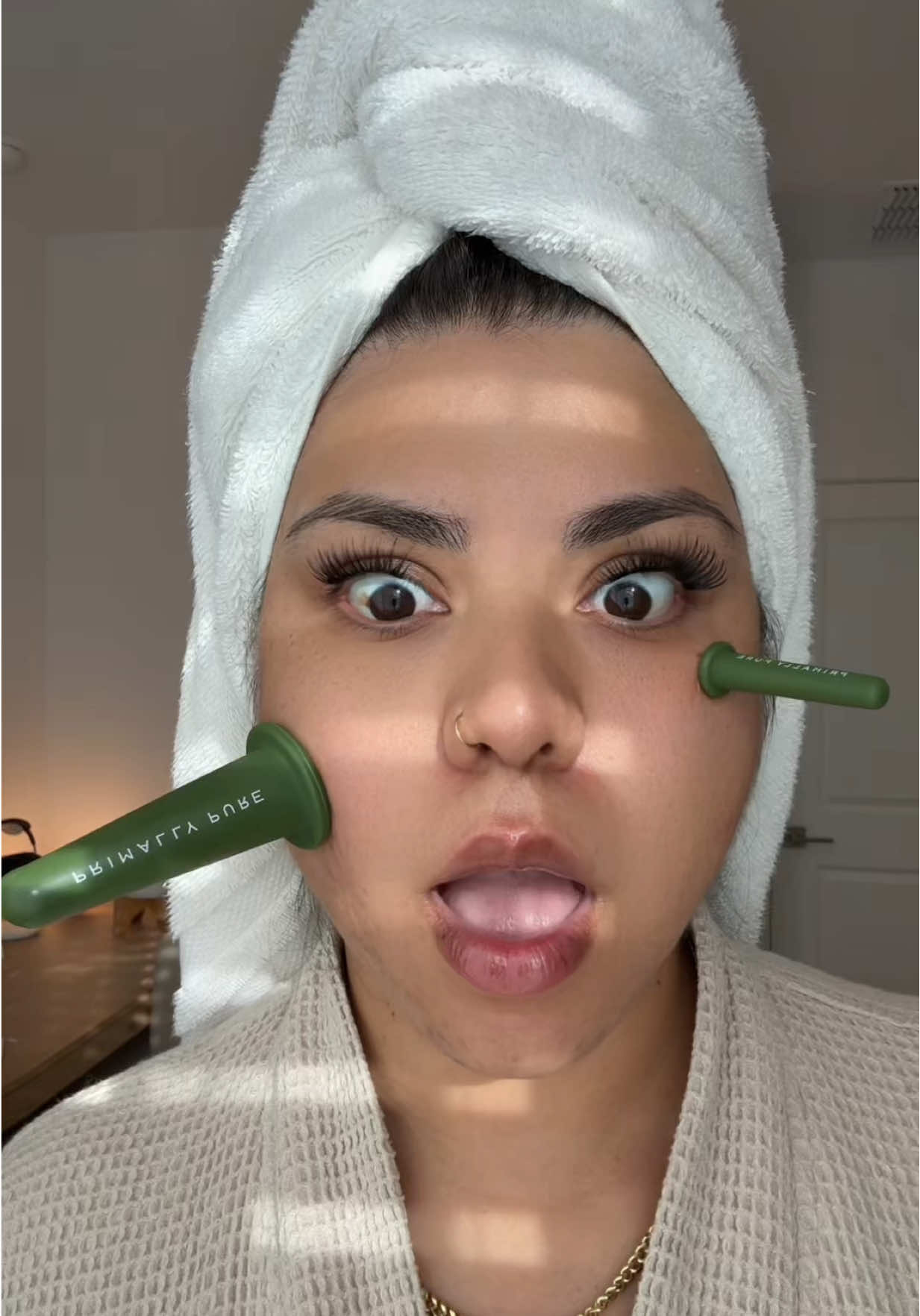 The secret to a sculpted, de-puffed face? Cupping and a little consistency 💋 #PrimallyPure #primallypure #facecupping #skincare 