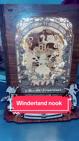 This one was super easy and quick! Nice soft lighting too! #aliceinwonderland #booknookdiy #booknook #diycrafts #christmasgiftideas 