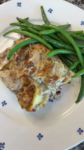 Potatoes au gratin with beef. I always have ground beef at home and I try to do something a little different with it instead of the same old  recipes. #EasyRecipe #familymeals #cookwithme #DinnerIdeas #groundbeef  Ground Beef & Onion Au Gratin Ingredients: * 2 lbs ground beef * 6 potatoes, thinly sliced * 1 yellow onion, thinly sliced * 4 cloves garlic, minced * Salt and pepper, to taste * 2 cups heavy cream * 2 ½ cups milk *  5 tbsp flour * 1 1/2 cup grated Parmesan  * 1–2 tsp Worcestershire sauce *1 tsp dried oregano *1 tsp dried thyme * Butter or olive oil (for cooking) Directions: 1. Sauté onions      * In a large skillet, heat butter or oil over medium-low heat.     * Add onions with a pinch of salt and black pepper and cook slowly until golden brown and soft add garlic and cook for 30 more seconds . Remove and set aside. 2. Slice potatoes and put in water to rinse. Dry off and sprinkle with a little salt then cook in oven at 400f for 15 minutes to draw out the moisture. This will prevent the final product from being watery. 3. Brown the beef:     * In the same pan, cook the ground beef until browned.     * Add, oregano, thyme, salt, and pepper. Stir to combine.     * If using a higher fat ground beef strain some of the fat out. 4. Make the sauce:     * Sprinkle flour over the cooked beef and stir for 1–2 minutes.     * Add onion and garlic      * Slowly whisk in milk and heavy cream. And then add the worstershire.     * Simmer until thickened slightly, then stir in 1 cup of the Parmesan until melted and smooth.  Taste for salt and pepper. 5. Assemble:     * Layer half the sliced potatoes in a greased baking dish.     * Spoon half the beef mixture over the top.     * Repeat with remaining potatoes and beef mixture. 6. Bake:     * Cover with foil and bake at 375°F (190°C) for 30 minutes.     * Uncover add the rest of the Parmesan and bake another 15 minutes until bubbly and golden on top. 7. Rest and serve:     * Let it sit for 10–15 minutes before serving so the sauce can set.