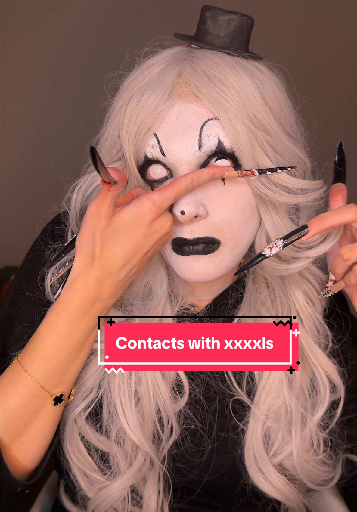 Replying to @I$$ąc_n!ght applying contacts with xxxxl nails 💅  #longnails #halloween #terrifier #contacts 