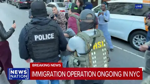 Protesters spit at an ICE vehicle as agents detain an arrestee in New York City. Protests broke out in the area over ICE operations targeting migrants setting up vendor shops. MORE: https://www.newsnationnow.com/us-news/immigration/border-coverage/protestors-authorities-clash-nyc/ 