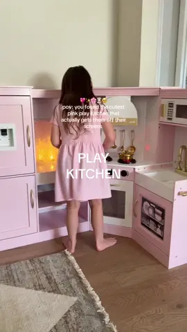this pink play kitchen set is one of my favorite finds as a mom! It's been keeping my girls busy for hours! The perfect 