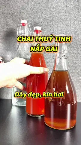 Chai thuỷ tinh nắp gài ,kín hơi , dày đẹp . 