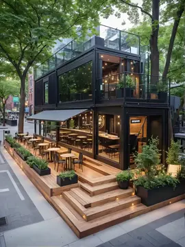 Phần 04: Thiết kế Độc Đáo: Quán Cafe Container 2 Tầng Lắp Ráp Nhanh Chóng Giữa Phố 🏗️☕️ Quá trình dựng Quán Cafe Container 2 tầng siêu ấn tượng! ✨ Sự kết hợp hoàn hảo giữa màu đen hiện đại và sàn gỗ ấm áp. Không gian bao quanh bằng kính sang trọng, có ban công tầng 2 để ngắm phố cực chill. Mô hình nhà lắp ghép/kinh doanh di động cực kỳ linh hoạt và thẩm mỹ. Xem ngay để lấy cảm hứng! 🤩 ​#NhàĐẹpContainer #NhàLắpGhép #CafeContainer #KiếnTrúcHiệnĐại #ThiếtKếQuánCafe