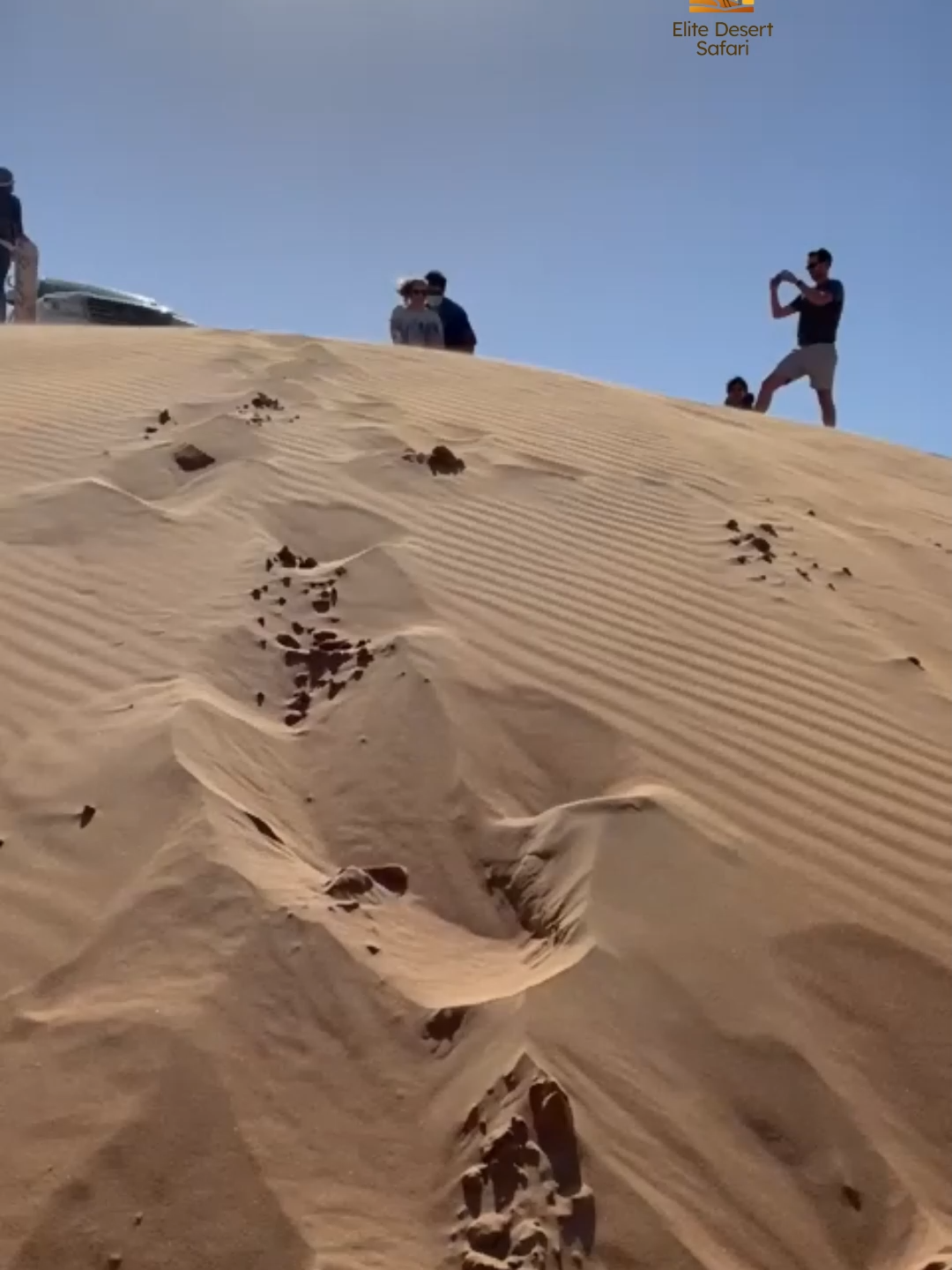 Slide down the golden dunes and feel the thrill of sandboarding in Dubai! It’s like snowboarding — but on warm, soft sand under the desert sun. #Sandboarding #DesertSafariDubai #EliteDesertSafari #DubaiAdventure #DesertFun #dubai #TravelDubai