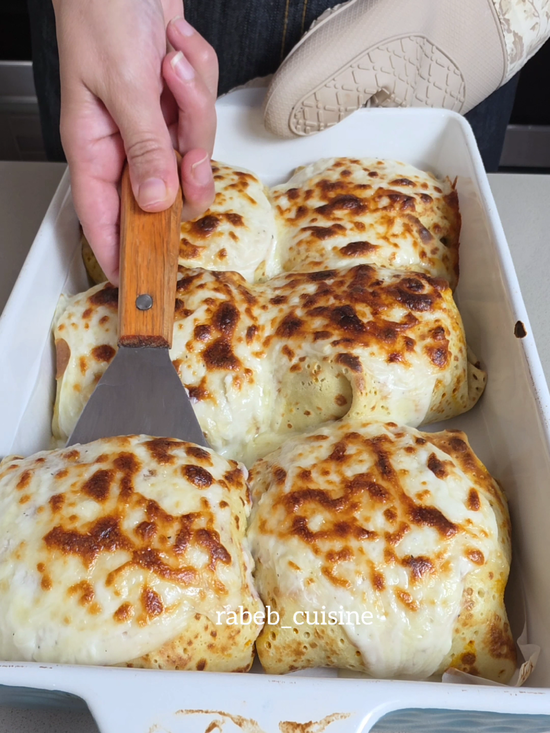 Crepe stuffed with Chicken. Method: For the Crepe: 6 eggs 750 ml milk  300 g all purpose flour 1 tbsp Salt  1 tsp black pepper For the Filling: Vegetable oil Chicken Breast One medium size onion  3 bell pepper 2 tbsp Paprika  2 tbsp ground Rosemary 1 tbsp black pepper 2 tbsp Salt 1 tbsp Turmeric 2 tbsp Harissa For Bechamel Sauce : 70 g butter 70 flour 600 ml milk  1 tsp salt 1 tsp black pepper Mozzarella Cheese #fyp #foodphotography #Foodie #tiktokfood #Love 