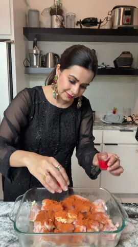 Stovetop Chicken Tikka Recipe Start by soaking the chicken in a mixture of water and vinegar for 20 minutes to help tenderize it and remove any unwanted smell. Drain the chicken well, then marinate it with salt, black pepper, ginger paste, garlic paste, lemon juice, yogurt, 2 tablespoons of chicken tikka masala, 2 tablespoons of tandoori masala, and a pinch of red food color. Let it sit for at least an hour, or overnight for deeper flavor. Heat some oil in a pan over medium heat, add the marinated chicken, cover, and let it cook until fully done and tender. Once cooked, remove the lid and increase the heat to dry out any excess moisture, stirring frequently until the chicken gets a nice roasted. For a smoky flavor, heat a small piece of charcoal until red-hot, place it in a small foil cup or onion peel in the middle of the chicken, drizzle a few drops of oil over it, and quickly cover the pan with a lid for 2–3 minutes to trap the smoke. Finally, garnish with thinly sliced onion and fresh cilantro, and serve hot with naan, rice, or roti. @laamofficials @shaikh_silk Product ID: FHQ5377 Use the coupon code “ RoohiAnwar” to get exclusive deals!  Flat $24.9 shipping to the USA #laamofficial #desiwear #chickentikkamasala #chickentikkarecipe  . #shawl :@Laam  Earrings: @Just Nakhre 