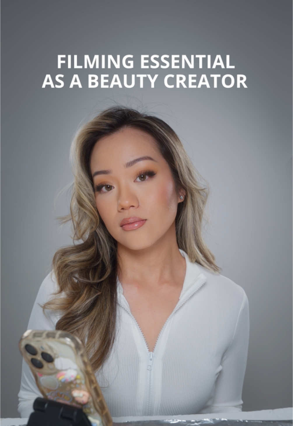 A projector stand is one of my filming essentials as a beauty creator. I use it to place my reflector and there is room for small items when filming such as my phone monitor and makeup products when doing macro shots. I love that you can adjust the height. It’s convenient, perfect for small spaces, and easy to move around ✨ #filming #ugctips #creatortips #beautycontent #contentcreator #makeup #studio #beauty