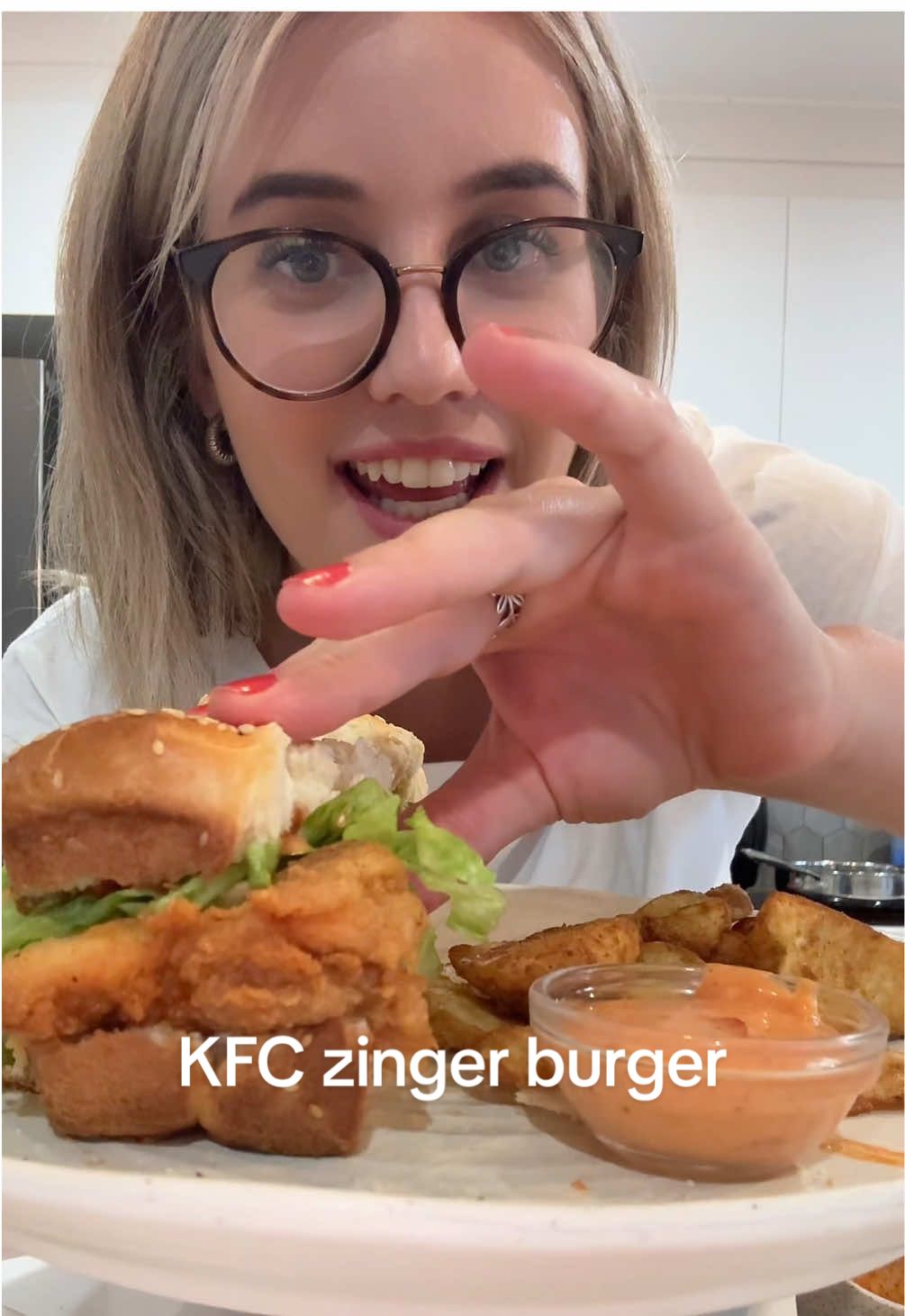 Homemade KFC Zinger Burger with Supercharged Sauce 🍔 Ingredients For the chicken: • 2 large chicken breasts (butterflied and flattened to burger size) • 1 cup buttermilk • 1 tsp salt • 1 tsp paprika • 1 tsp garlic powder • ½ tsp cayenne pepper (add more if you like it extra spicy 🔥) For the coating: • 1 ½ cups plain flour • 1 tbsp cornflour • 1 tbsp paprika • 1 tsp garlic powder • 1 tsp onion powder • ½ tsp cayenne pepper • Salt and pepper to taste For frying: • Vegetable oil (enough to deep or shallow fry) For the burger build: • 4 burger buns (toasted slightly) • 4 slices cheese (optional but sooo good) • Iceberg lettuce (shredded) • Mayonnaise (for the bun) 🌶️ Supercharged Sauce Copycat Ingredients: • ½ cup mayonnaise • 1 tbsp sriracha or hot sauce • 1 tsp garlic powder • ½ tsp onion powder • 1 tsp lemon juice • 1 tsp sugar • Pinch of salt • Optional: dash of white vinegar for a sharper kick Method: Whisk all together until smooth and creamy. Adjust heat level with more or less sriracha. Instructions 1.	Marinate the Chicken: Combine buttermilk, salt, paprika, garlic powder, and cayenne. Add chicken, cover, and refrigerate for at least 2 hours (overnight for best flavor). 2.	Prepare the Coating: Mix flour, cornflour, and seasonings in a shallow bowl. 3.	Coat the Chicken: Remove chicken from marinade, let excess drip off. Dredge thoroughly in flour mixture — press it in well to get that crispy texture. For extra crunch, dip it back into the buttermilk and flour again (double coat = double crispy 😉). 4.	Fry: Heat oil to 170–180°C. Fry chicken 5–6 minutes per side, until golden and cooked through. Drain on a rack or paper towel. 5.	Assemble: Toast buns lightly. Spread mayo on the bottom bun. Add lettuce, then chicken, drizzle generously with your homemade supercharged sauce, top with cheese (if using), then crown with the top bun. #kfc #dinner #EasyRecipe #burger #fyp 