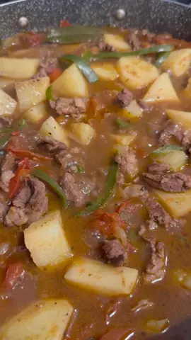 Carne Guisada - Mexicana Style Beef Stew This Carne Guisada is the ultimate Latin beef stew with strips of tender beef simmered low and slow with potatoes. Simply delicious!!! #carneguisada #carneconpapas #carneconchile #beefstew #mexicanbeefstew                   Ingredients/Recipe: -2 1/2 Lbs Thin Beef Chuck Steak cut into strips -3 Tbsp Avocado Oil or cooking oil of your choice -2 Tsp Garlic Salt -1 Tsp Pepper -1/2 White Onion, sliced -4 Jalapeño Peppers, sliced and seeds removed (optional) -1 Tsp Thyme -1 Tsp Paprika -1 Tsp Tomato Bouillon -1 Tsp Oregano -5 Sliced Roma Tomatoes -3 Bay Leaves -2 Cups Water -5 Potatoes peeled and cut into fourths -Salt to Taste Instructions: 1. Heat oil in a large skillet over medium heat. 2. Add meat, season with garlic salt and pepper and stir to combine. Cook meat for 10 minutes. 3. Add onion, jalapeños, thyme, paprika, tomato bouillon, oregano and stir to combine. Sauté for 3 minutes. 4. Add tomatoes, bay leaves and stir to combine. Saute for 3 minutes. 5. Add water and stir to combine. 6. Add potatoes and stir to combine. 7. Cover and simmer over medium-low heat for 25 minutes or until potatoes are tender. Hope you enjoy this recipe!!!👩‍🍳😋