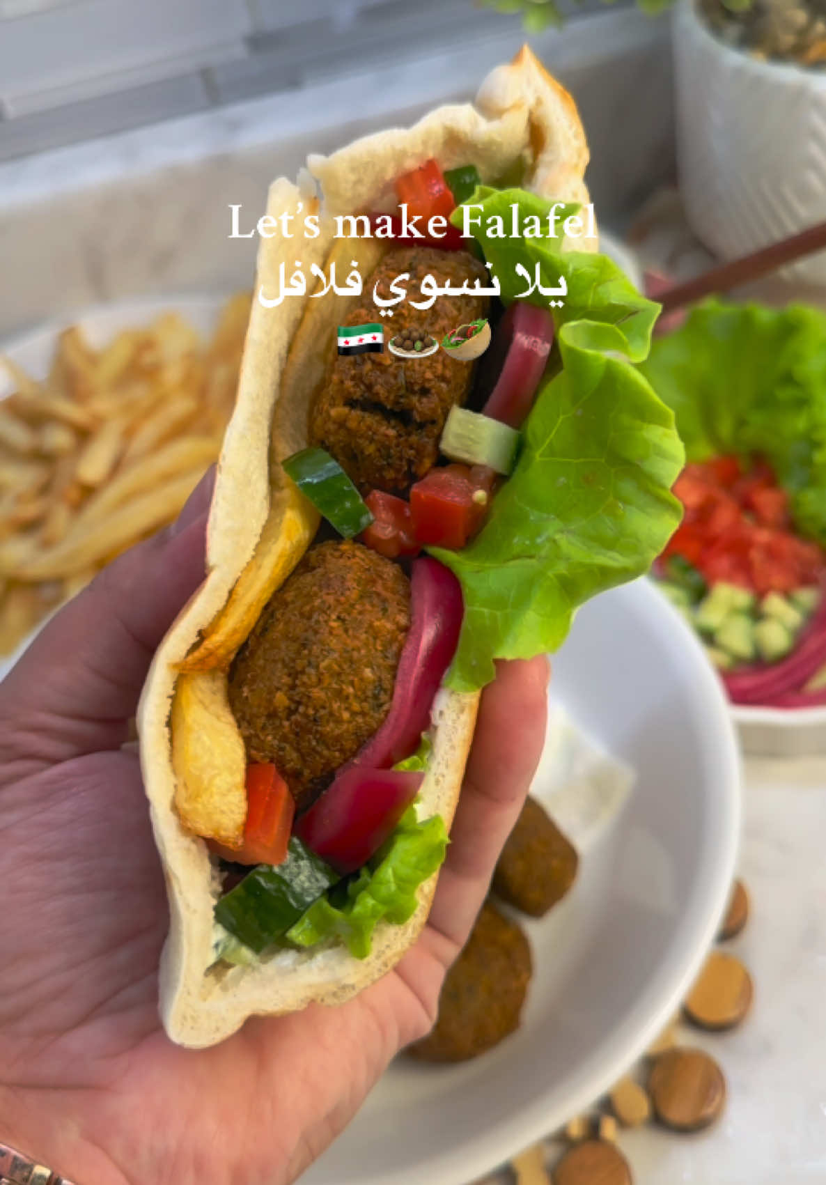 Homemade Falafel, so crispy, so good 🤤🧆 recipe: - 1 lb dry chickpeas - 1/2 onion  - 2–3 garlic cloves - 1 cup fresh cilantro  - 1 cup fresh parsley  - 1/2 tsp baking powder - 1 tsp cumin  - 1 tsp paprika - 1/2 tsp turmeric  - 1/2 tsp black pepper  - 1 1/2 tsp salt  Cucumber Yogurt sauce:  - 1 cup Greek yogurt  - 1 tbsp lemon juice (1/2 lemon) - 1 cucumber, shredded  - Dash of salt and pepper  (450 جم) حمص ناشف 1/2 بصلة 2–3 فصوص ثوم 1 كوب كزبرة طازجة 1 كوب بقدونس طازج 1/2 ملعقة صغيرة بيكنج باودر 1 ملعقة صغيرة كمون 1 ملعقة صغيرة بابريكا 1/2 ملعقة صغيرة كركم 1/2 ملعقة صغيرة فلفل أسود 1 1/2 ملعقة صغيرة ملح صلصة الزبادي بالخيار: 1 كوب زبادي يوناني 1 ملعقة كبيرة عصير ليمون (نصف ليمونة) 1 خيار مبشور رشة ملح وفلفل  #Falafel #HomemadeFalafel #FoodTok #MiddleEasternFood #CrispyFalafel #وصفات_بيتية #اكل_عربي #طبخ_بيتي #فلافل #وصفات_سهله  @FAGE 
