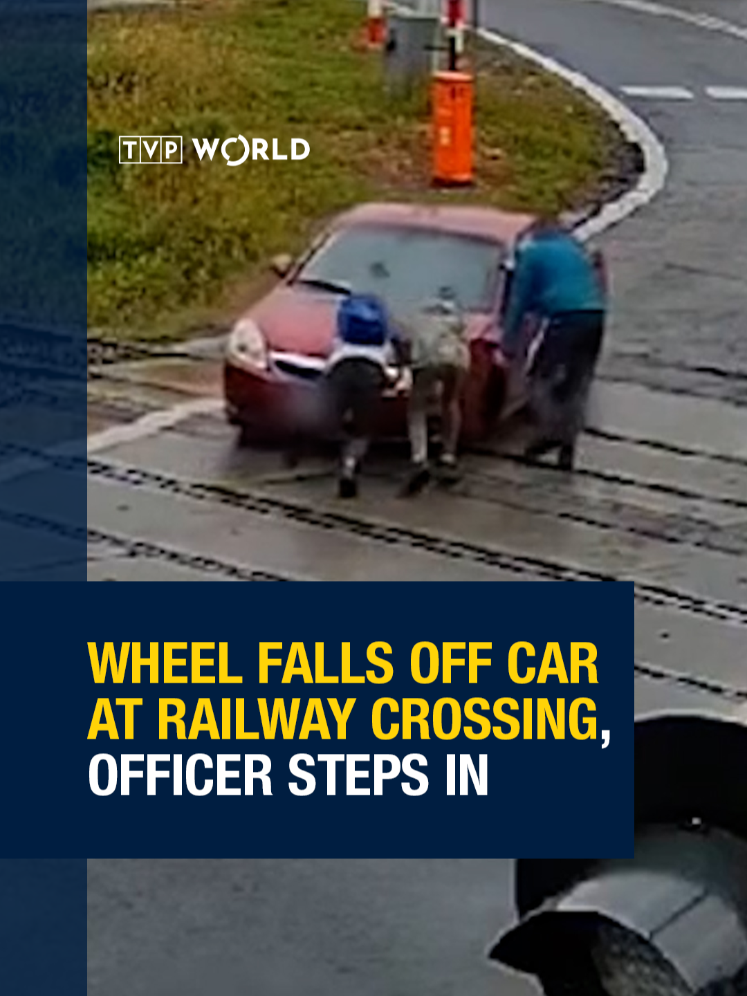 A car lost its wheel while crossing train tracks in Katowice in southern Poland. The driver was stuck - until a police officer stepped in just in time. #PoliceHero #Katowice #TrainTracks #Poland #CarAccident