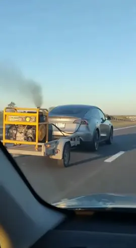 Tesla being charged by a diesel generator. Technology, huh? 🤷‍♂️ / Тесла заряджається від дизеля — technology?  #elonmusk #Technology #Diesel #Viral #shorts 