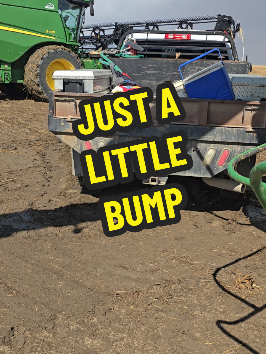 The combine almost got a little bump in the muddy field.  I didn't think he was going to stop sliding.  #farm #crash #harvest #rain #onthisday 