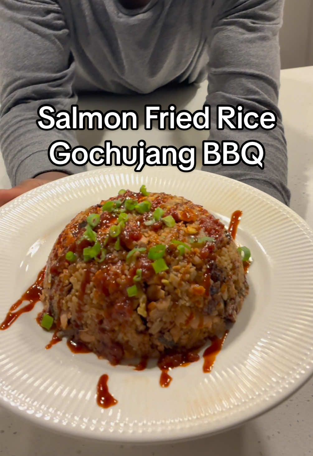 Ginger Garlic Salmon Fried Rice with @bibigo kitchen gochujang & @socialsauceclub “the cue sauce” 🍣  P.s. - leaving the skin on takes this meal to the next level  #salmon #food #Recipe #fyp #socialsauceclub 