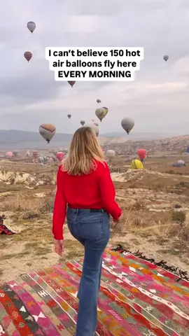✨Welcome to Cappadocia, where everyday is like a hot air balloon festival. 🎈 Every morning 150 hot air balloons fly over the “fairy chimneys” of Cappadocia in a magical and colorful display. 🤯It blew our minds to think about how in the U.S. people plan years in advance and travel far and wide to go to hot air balloon festivals, but in Cappadocia they do this literally every day. If you visit Turkiye, riding in a hot air balloon is a must-do! Rides last about an hour and generally cost $150-200 per person. When you go, book your hot air balloon ride for your first morning in the region, so that if it gets cancelled due to weather, you can maximize your chances of rebooking another morning. Have you ever ridden in a hot air balloon? #bucketlisttravel #goturkiye #cappadocia #hotairballoons #uniquedestinations