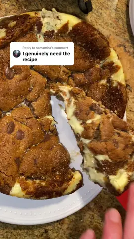 Replying to @samantha the recipe we’ve all been waiting for 👏 genuinely one of the best things I’ve ever eaten Cookie dough: - 2 sticks unsalted brown butter- cooled - 1/4 cup granulated sugar - 1 1/2 cups dark brown sugar - 2 eggs room temp - 1 egg yolk room temp - 1 tbsp vanilla  - 2 1/4 cup AP flour - 2 tsp baking soda  - hefty 1/2 tsp salt - chocolate chunks- I recommend chocolate bar. I used Tony’s milk chcolate  Cheesecake filling: - 2 block (16oz) creamcheese- full fat Philadelphia  - 2 eggs - 3/4 cup granulated sugar - 2 tsp vanilla Steps: - make cookie dough first by mixing the wet ingredients than folding in the dry ingredients. Once the flour just barely disappears, fold in chocolate. Do not over mix. - line the entire cake pan with parchment paper! Don’t want it to stick to the bottom or sides  - layer bottom of pan with dough. Leave about 1/3-1/4  of dough for top  - make cheesecake filling by combining all ingredients and mixing with hand mixer until all clumps are gone. Do not over mix - pour cheesecake filling over cookie dough. 🚩I did NOT use all the filling and had some left over. I wanted to be safe than sorry. So only use enough to cover the cookie dough and add just a little bit of height  - add cookie dough on top. I didn’t do one big layer like the bottom. I split them into tiny little pieces and they spread once in the oven to cover the surface area of the top - bake on 350 degrees F for 45-55 mins. I wanted mine more gooey as you can see but if you want it to be more firm leave it in on the longer side (I didn’t want to burn the cookie dough) - top with sea salt - leave in fridge preferably over night  Disclaimer: this is more of a pie-ish dessert! It’s not as firm as a cheesecake but that’s the way we wanted it. It’s a little messy but so worth it I promise  Enjoy !!🤤🍪🍰 #fyp #baking #cheesecake #cookiedough #chocolatechipcookie 