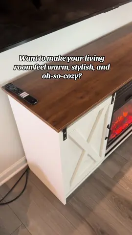 Want to make your living room feel warm, stylish, and oh-so-cozy? This HOMBCK Fireplace TV Stand brings farmhouse charm and modern comfort together in one beautiful piece. With its 23-inch electric fireplace, sliding barn doors, and adjustable storage, it’s the perfect blend of function and style. Use the flames with or without heat — for cozy vibes all year long! Warm Ambiance: Creates a relaxing, cozy environment in seconds. Space-Saving Design: Keeps everything neat while adding rustic charm. Year-Round Comfort: Fireplace can be used with or without heat for any season. Add warmth and charm to your living space today. #FireplaceTVStand #FarmhouseDecor #CozyHomeVibes #LivingRoomGoals #HomeMakeover