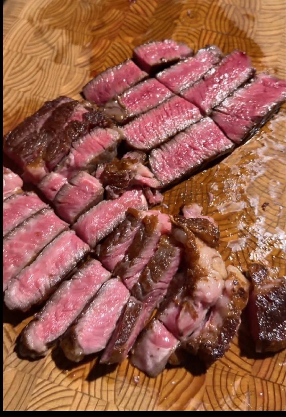 🍽️🥩🤷🏻‍♀️ She asked for a Steak The boss asked for steak which is unheard of 😂 luckily I can cook a steak like nobody’s business 💅🏻 you can see by her reaction the Wagyu is soo rich, I think it’s best to share and serve next to more regular steaks for the right experience 🤷🏻‍♂️  METHOD Steak seasoned in kosher salt  Left to dry brine 5 hours to overnight Ribeye scored and marinated w teriyaki  Wagyu beef tallow in the stainless steel pan  Starting with the filet that will render fat Seared on both sides with a weight Flipping to further browning an even cooking  Put to the side with a wire rack to carryover  Ribeye in the pan w a weight Hard sear, flipped and basted center eye  Teriyaki under the broiler in a preheated pan Steaks in the pan for a final push of heat Teriyaki topped a maple butter  Hit with the searzall and sliced AAA Ribeye from @Woodward Meat Purveyors  A5 Wagyu Filet mignon @thebutchershoppe_to . . . #Steak #Ribeye #FiletMignon #mediumrare #Wagyu 