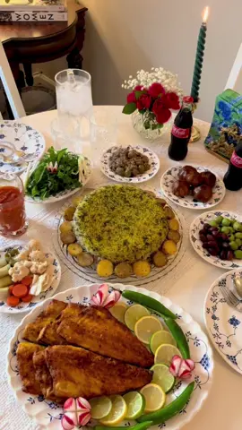 Sabzi Polo ba Mahi 😋 Sabzi polo is one of the most delicious Persian pilafs, made with rice and a mix of fresh aromatic herbs. It pairs beautifully with fried or oven-baked fish. Ingredients (serves 3–4) For the fish: 6 branzino fillets 1 large onion 1 lemon 2 tablespoons bloomed saffron 1 teaspoon salt ½ teaspoon black pepper ½ teaspoon garlic powder ½ teaspoon ginger powder 1 tablespoon turmeric 6 tablespoons flour For the rice: 2–3 cups rice 1 tablespoon salt Aromatic herbs (parsley, cilantro, dill, chives or spring onions - one bunch of each) 2 tablespoons bloomed saffron A few tablespoons of oil Optional side dish: 12 small potatoes (3–4 per person) 1 tablespoon salt Olive oil Black pepper Instructions: 1. Marinate the fish: Grate the onion and squeeze out its juice (you’ll use only the juice, not the pulp). In a bowl, mix the onion juice, lemon juice, bloomed saffron, salt, black pepper, garlic powder, and ginger powder. Add the fish fillets and coat them well in the marinade. Cover and refrigerate while you prepare the rice. 2. Prepare the Sabzi Polo: Wash the rice 3 times, then soak it in water with 1 tablespoon of salt for about an hour. To prepare the herb, remove the leaves of the herbs from their stems and soak them in cold water for about 10 minutes. Drain and repeat this process until there’s no dirt or sand left. Chop the herbs finely and set aside. Bring a large pot of water to a boil, add the rice, and cook until it’s about 80% done. Add the chopped herbs, stir gently to mix, then drain the rice and herbs together. In the same pot, add some oil and a bit of bloomed saffron to the bottom (for a golden tahdig). Spoon in the rice-herb mixture, cover, and steam on low heat for about 45 minutes. 3. Fry the fish: In a shallow plate, mix turmeric and flour together. Remove the fillets from the marinade and coat them lightly in the flour mixture, shaking off any excess. Heat olive oil in a large pan over medium heat. Fry the fish fillets, flesh side down first, then skin side, until both sides are golden and crispy. 4. Optional potato side: Boil the small potatoes (with skin on) in salted water until tender but not mushy. Drain and cut them in half. Pan-fry the potatoes in olive oil with a little black pepper until both sides are golden. Set aside. 5. Serve: Serve Sabzi Polo with the crispy fish, optionally with Kookoo Sabzi, pickled garlic, and fresh lime or sour orange on the side. Noosh-e jaan! 😋 #persiancuisine #persianfood #persianrecipes #sabzipolo #breadedfish 