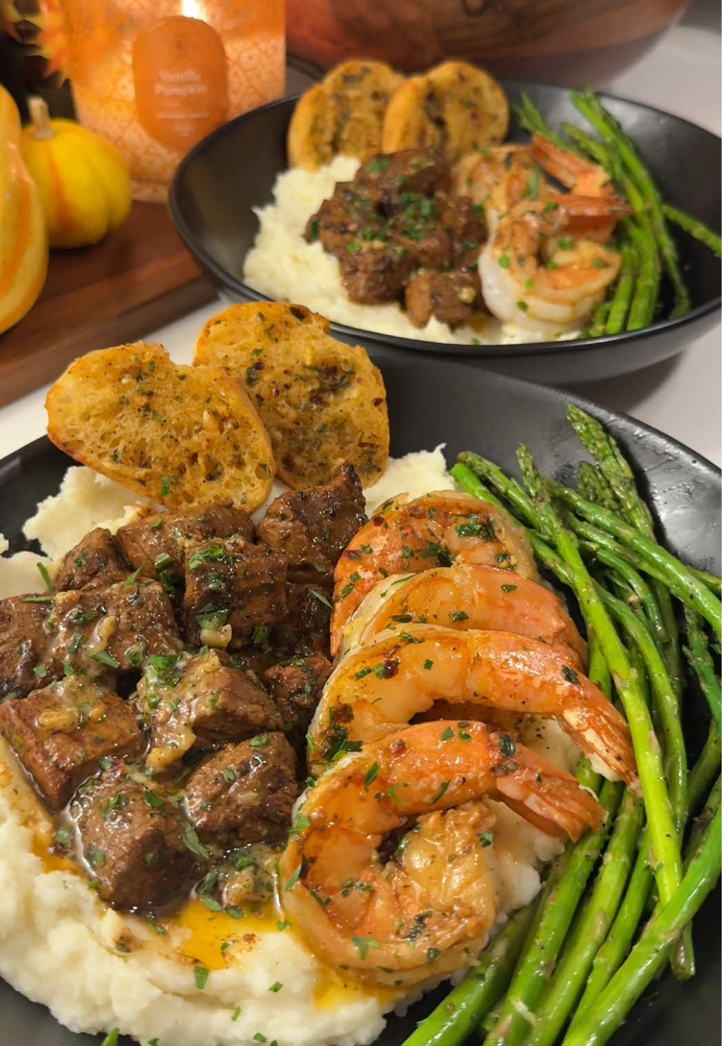 Cajun garlic butter steak & shrimp over truffle mashed potatoes❤️🥩🍤 recipe: Cajun garlic butter recipe🧈 -4 tbsp softened unsalted butter -1 tbsp chives -1 tbsp parsley -1 tbsp Dijon -2 minced garlic cloves  -lemon juice ~1 tsp -salt, pepper, Cajun seasoning, red pepper flakes (~1/4 tsp each) garlic butter steak & shrimp🥩 -trim NY strip steak into 1 inch bites -season and sear in avocado oil on med/high heat in a cast iron  -toss in 1-2 tbsp butter -remove steak and add jumbo shrimp in the same pan -flip after 1-2 mins -remove shrimp and add asparagus -top asparagus with Parmesan garlic parm mashed potatoes🥔 -2 boiled & mashed russet potatoes -2 tbsp truffle oil -grated Parmesan -heavy cream ~1/3 cup -salt, pepper, garlic powder to taste garlic bread🥖 -top ciabatta baguette with butter and bake at 400 for 5 mins #DinnerIdeas #cookingtiktok #fyp #EasyRecipe  #creatorsearchinsights 