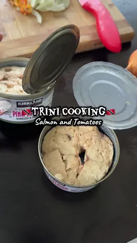 🇹🇹Trini Salmon and tomatoes. Recipe👇 Ingredients: - 2 cans salmon - 2 tbsp oil - 2 cloves garlic optional - 3 pimento peppers - hot pepper optional - 3 Roma tomatoes - 2 or 3 springs green onions - salt and pepper to taste  #trini_tiktoks #trinicooking #trinifood #cannedfood #salmonrecipe 