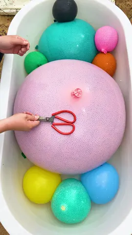 Balloon vs. Scissors — will it pop? 