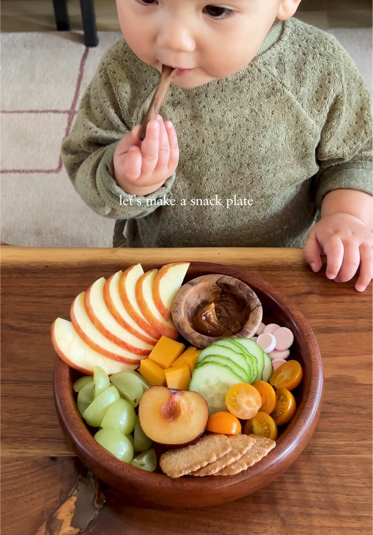 todays snack plate jonagold apples and salted caramel cheddar cheese grapes and cucumbers a plum garden tomatoes yogurt bites and gosomi crackers