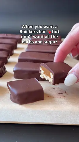 Try my Healthy Snickers Bars!! 🍫🥜 Recipe is in my profile link or just Google “baketobefit snickers bars” #ketocandy #healthycandy #sugarfreechocolate #healthyrecipes #ketodessert 