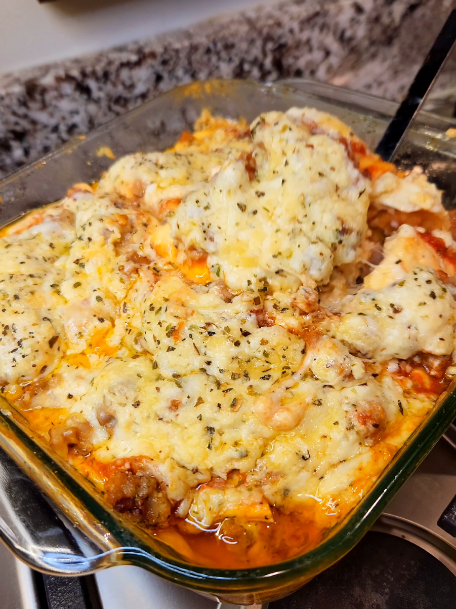 I'm not that kind of girl 😏 It's only homemade around here. This MILLION DOLLAR LASAGNA is my favorite easy go to recipe. As my 12 year old says.. it's better than grandma's! Regular lasagna noodles can be used but I make blender noodles to keep things low carb. Want the recipe? What is million dollar lasagna you ask? It alternates between using marinara AND alfredo sauce in the layers 😍 The combo of acidic sweet tomatoes and rich creamy decadence is top tier What You Need: 1 lb ground sausage or beef 1 cup marinara 1 ⅓ cup alfredo 1 cup cottage cheese 1 egg 1 tsp italian seasoning 1 tsp oregano 9 precooked lasagna noodles 1 cup shredded mozzarella Cook meat in skillet until no longer pink then set aside. Mix together cottage cheese, egg, and italian seasoning Spread 1/3 cup alfredo in the bottom of a 9x9 baking dish. Divide each of the remaining ingredients into 3 equal parts In the baking dish layer: noodles, meat, marinara, cottage cheese mixture, mozzarella, oregano, & alfredo Repeat layers twice more then finish with a sprinkle of parmesan cheese. Cover with foil. Bake at 375° for 35 minutes #EasyRecipe #lasagna #food 