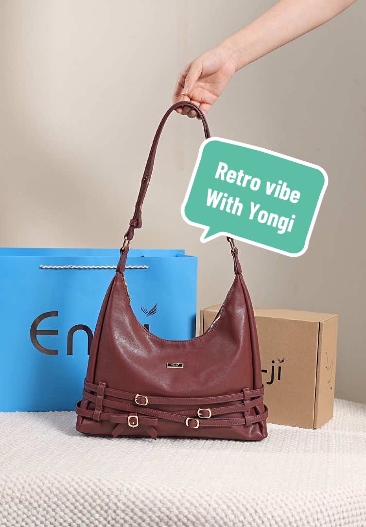 Not your typical shoulderbag. it's YONGI brings a retro soul with a modern twist. 💖 Bold color and aesthetic belt accent make it the perfect match for your edgy, go-getter vibe. Campus vibes or casual days out. Yongi brings that chic vintage charm to every moment. Available bold & earthy color : Nougat, Cream, Black & NEW EXCLUIVE COLOR : Mulberry #Enjiid #BanggaPakeEnji #Shoulderbag  #TasWanita