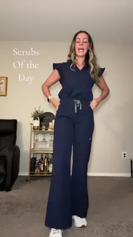 This is me in a scrub top I am OBSESSED 😍 Shoutout to @Taylor | NP Student for convincing me I needed this top!  • • @wearfigs #isabelwideleg #scrublife💉 #healthcaregirlies #scrubsoftheday #catscan 