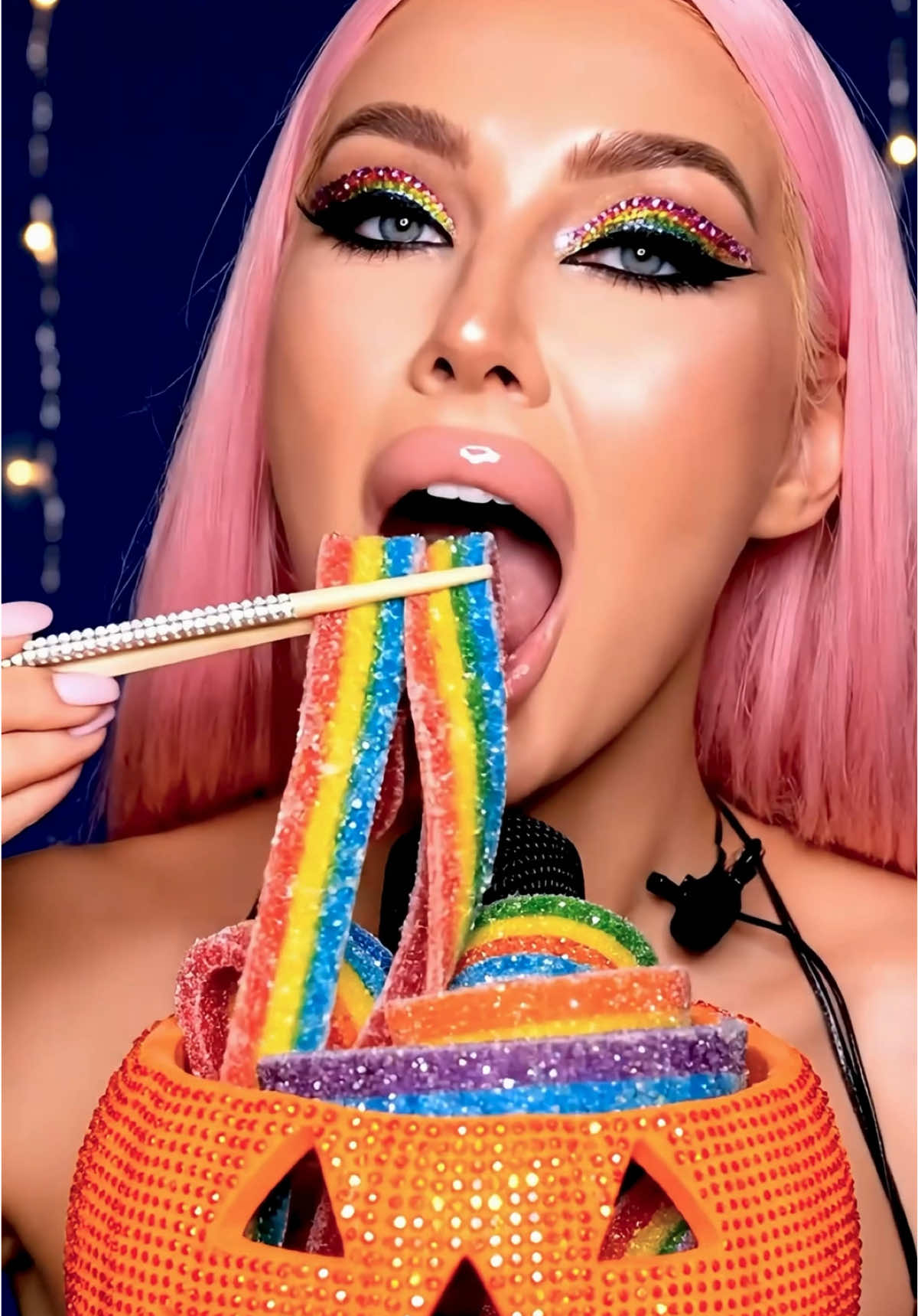 Eating rainbow candy sour belts out of a rhinestone Jack-o’-lantern in this whisper ASMR mukbang #sourcandy #candy #pumpkin #mukbangasmr #asmrfood 