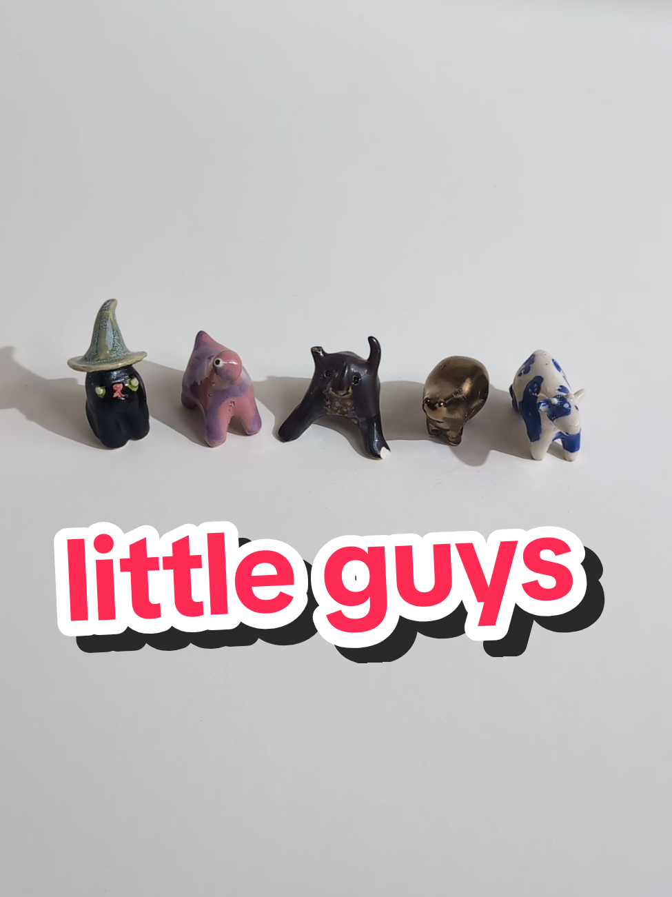 just some little guys!!! you've never seen a little guy before?! Let me know which one is your favorite. I'm torn between the cow and the cat.  #minipottery #smallceramics #handbuiltceramics 