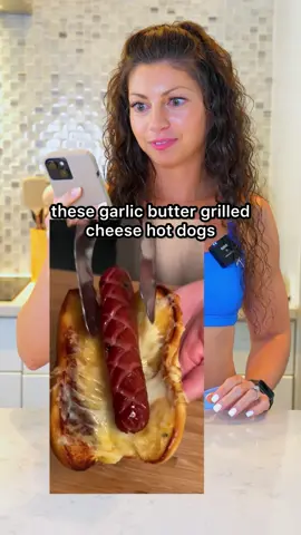 ✨Macros Made Easy✨ Part 7 🌭 Garlic Butter Grilled Cheese Hot Dog Original video and recipe by @Allrecipes  (and I’ve included my recommended 👉SWAPS) Ingredients: 8 hot dogs 👉 8 Kirkland Parmesan & Cracked Black Pepper Chicken Sausages  8 tbsp butter 👉 4 tbsp butter  8 hot dog buns (no swap, could use a low carb bun if you wanted) 2 cups shredded cheese 👉 1 cup part skim mozzarella + sprinkle of Parmesan  The original recipe calories/macros for 8 grilled cheese hot dogs: 546 calories 32g carbs 38g fat 19g protein 👉MME✨ modified recipe for 8 grilled cheese chicken dogs:  400 calories 28g carbs 20g fat 23g protein #macrosmadeeasy #macrofriendly #highproteinrecipes #comfortfood 