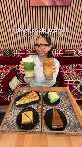 Things to do in the IE — part 3 ⋆.˚☕︎  @Qamaria Coffee has officially opened in Rancho Cucamonga 🤩 This coffee shop serves Yemeni coffee & MOUTHWATERING desserts like pistachio kunafa cheesecake, saffron milk cake, honeycomb bread and baklava (walnut or pistachio flavored)! This place is HUGE and so study/work friendly 🙇🏻‍♀️ the interior is gorgeous and super comfy to stay in for hours I am so excited to make this part of my coffee shop rotation 🫶 Menu items in video: • Iced Qamaria Latte • Iced Mango Matcha Latte • Biscoff Cheesecake • Pistachio Milk Cake • Walnut Baklava • Honeycomb #yemenicoffee #iecoffeeshops ##qamariacoffeeco#iefoodie #thingstodointheie 