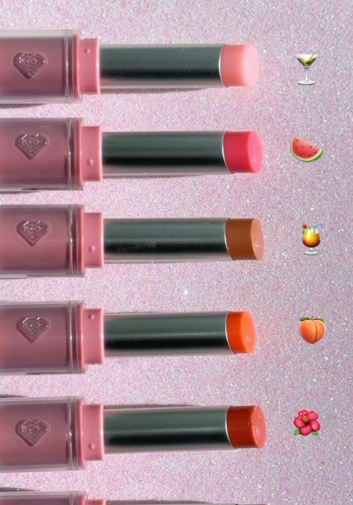 The lineup your lips dream about ✨💭 Which Juicy Glass Lip Balm shade are you swiping? Drop your emoji in the comments  🍸 Lychee Spritzer 🍉 Watermelon Cooler 🍹 Coconut Colada 🍑 Peach Mimosa 🌺 Guava Punch 🍷 Cranberry Sangria  Grab yours in-stores & online @Ulta Beauty 