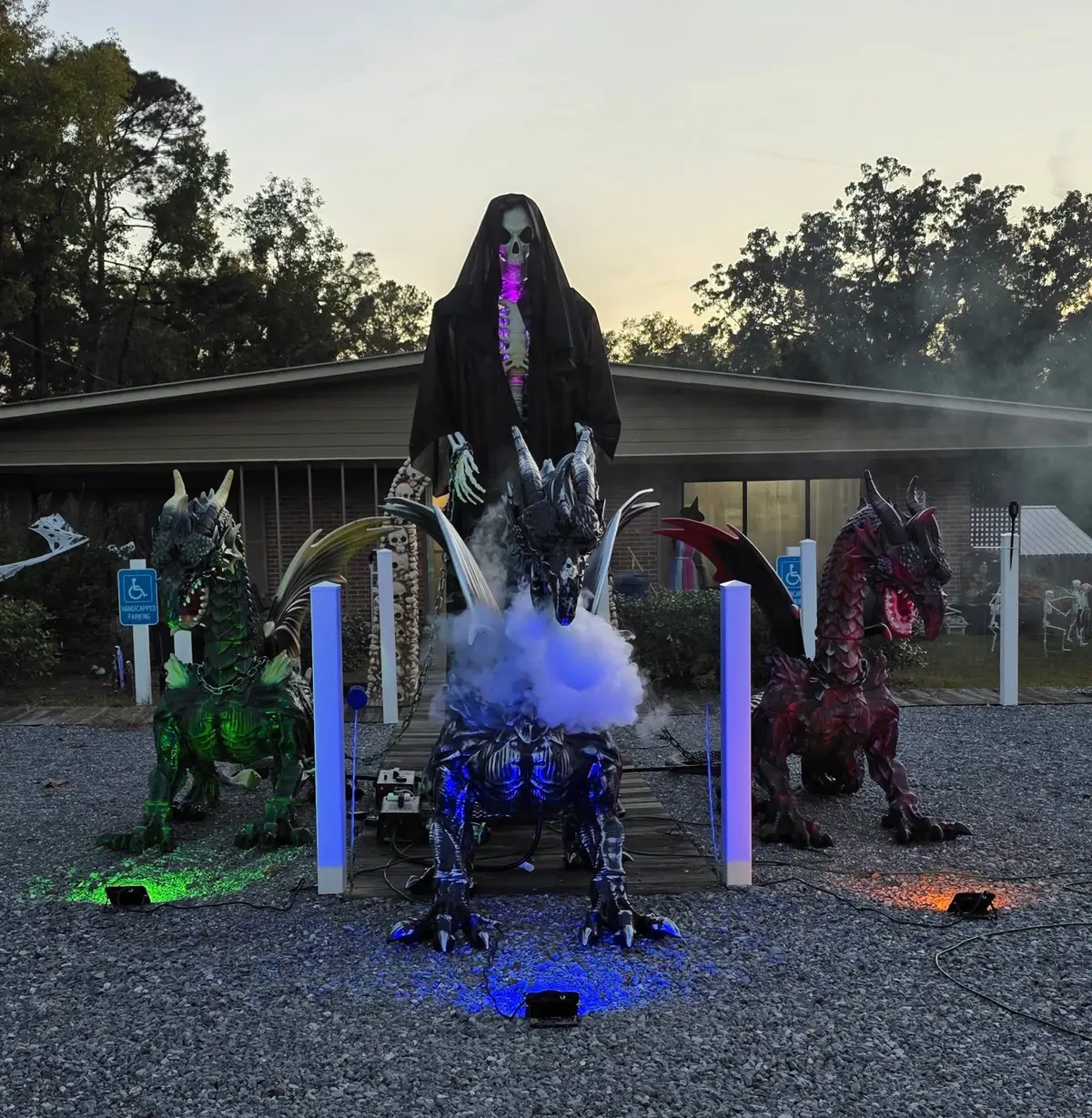 Our dragon display for Halloween this year, only missing the purple one and we’ll have the whole set.