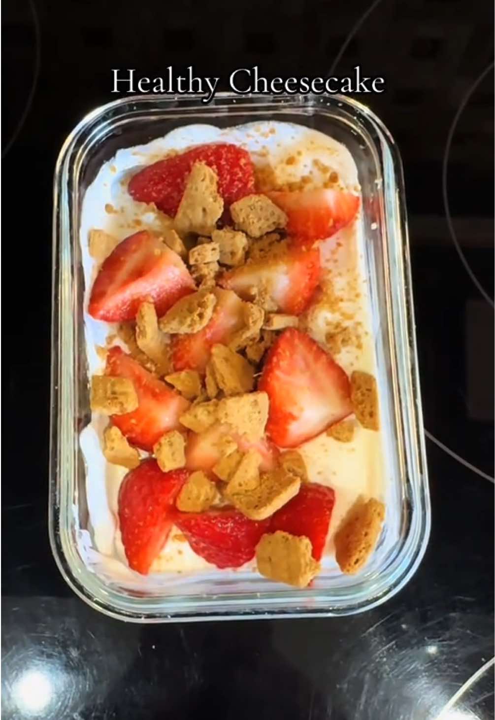 Healthy cheesecake: Cut up strawberries  Add swerve (optional) 2 cups of vanilla greek yogurt 1/2 cup zero sugar cool whip 1 scoop vanilla protein powder 1/4 of cheesecake zero sugar mix Mix together Add toppings of your choice (strawberries, blueberries, peaches) Crush 3-4 sweet thins on top (could also substitute granola) #healthyrecipes #healthydessert #sweettreats 