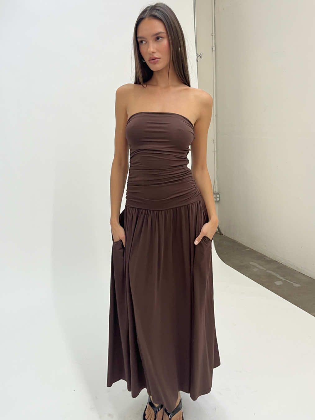 best selling silhouette in this season’s most loved color. shop the santal dress now  #santaldress #niathebrand #falldresses #weddingguestdress #browndress 