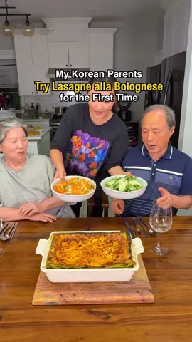 Replying to @J See how I made this in previous video. I made two versions. First is the traditional version of Lasagne alla Bolognese which focuses more on the deep rich meat sauce rather than tomato sauce or cheese. This is different from ones from other regions in Italy. The only regret is I should have let it rest a little less so it’s a little more gooey. Second version is more non-traditional… I added some mozzarella because mom and dad just love mozzarella.  I have a feeling they might ask for lasagna for dinner soon. #l#lasagnel#lasagnaitalian #italiano #italianfood 