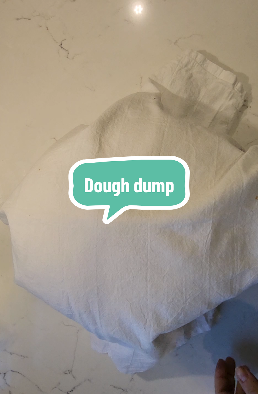 was itching to mix dough as one does and mixed this dough late in the evening around 6pm. I used VERY cold water, and about 80 grams of starter per loaf (this is a double batch). It was temping at 67 degrees after mixing. did three rounds of fold and called it a night... literally.  woke up to the tallest bowl of dough I've ever seen in person. was worried it was overproofed. but I was pleasantly surprised. it handled nicely! I used no flour while shaping and it didn't stick to my hands or the counter  #sourdoughtok #freshlymilledflour #sourdoughbread #doughdump 