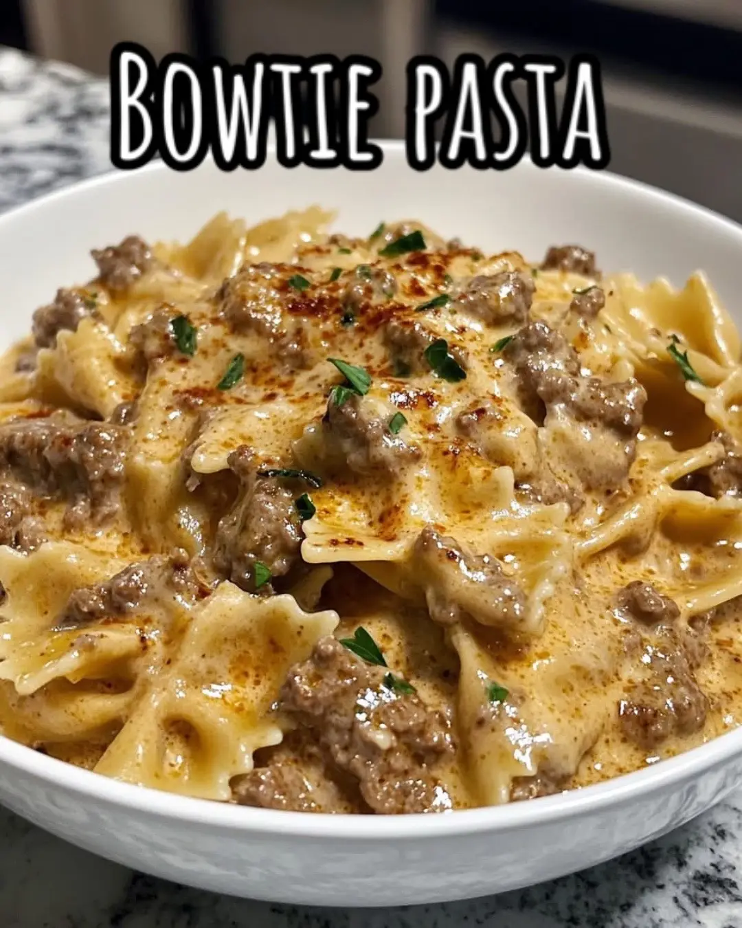 🍝 Creamy Parmesan Garlic Beef Bowtie Pasta Ingredients: 	•	1 lb ground beef 	•	1 teaspoon Worcestershire sauce 	•	1 teaspoon Italian seasoning 	•	3 tablespoons butter 	•	3 cups beef broth 	•	8 oz bowtie pasta 	•	1 cup freshly grated Parmesan cheese 	•	1 tablespoon minced garlic 	•	1 cup heavy cream (or half & half for lighter option) 	•	Salt & pepper to taste 	•	Fresh parsley for garnish Instructions: 1️⃣ In a large skillet, brown the ground beef over medium heat. Drain excess grease. 2️⃣ Stir in Worcestershire sauce, Italian seasoning, salt, and pepper. 3️⃣ Add butter and minced garlic, cooking until fragrant (about 1 minute). 4️⃣ Pour in beef broth and bring to a simmer. 5️⃣ Add bowtie pasta, cover, and cook until tender (about 10–12 minutes). 6️⃣ Reduce heat to low, then stir in heavy cream and Parmesan cheese until creamy and thickened. 7️⃣ Taste and adjust seasoning as needed. 8️⃣ Garnish with fresh parsley and extra Parmesan before serving! 😋