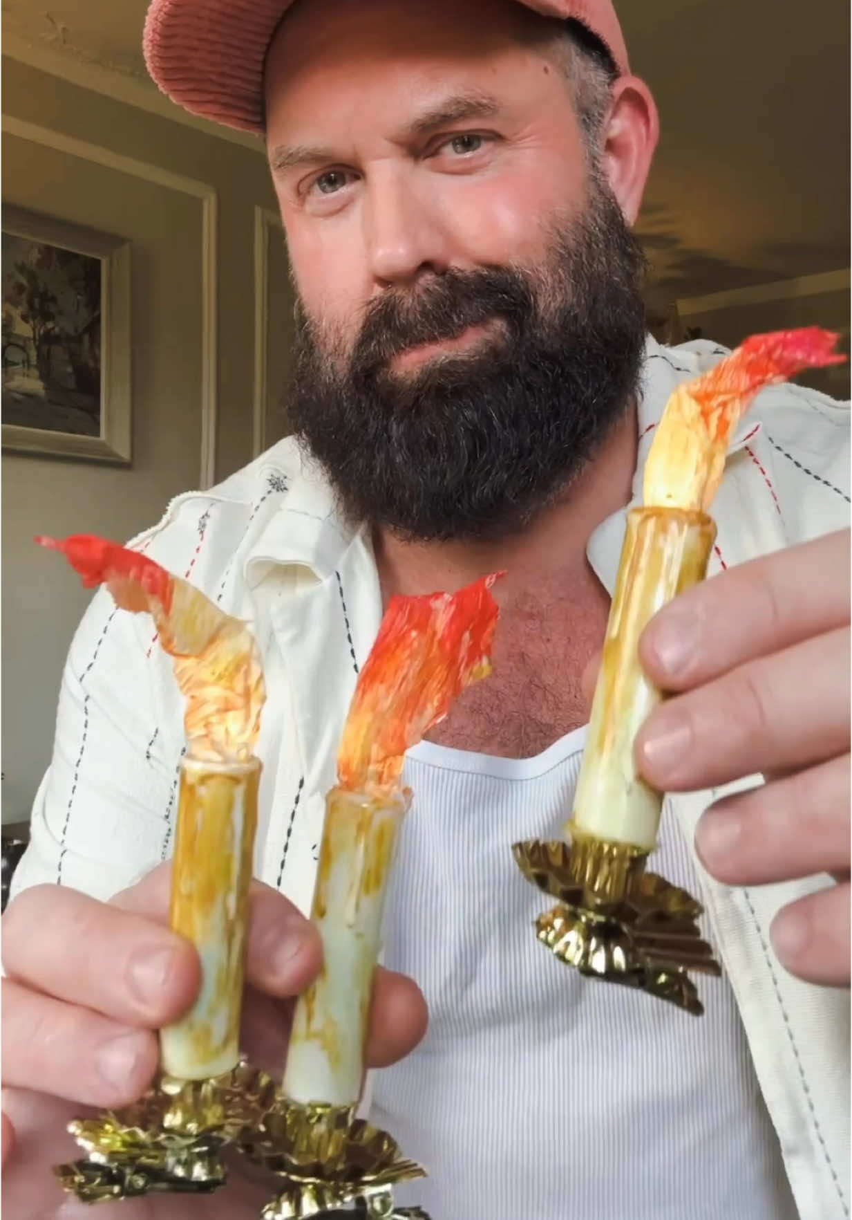 Adding some hand painted paper mache candles to my twisted Halloween tree. This are really easy to make. They light up with one battery each using a remote. Just some crepe paper, watercolor paint, and some Christmas ornament candle clips. Link to supplied if you’re interested is in my bio/ Amazon storefront. Cheers! #halloween #halloweencrafts 