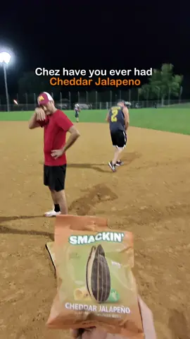 Reviewing Cheddar Jalapeño sunflower seeds during the game🫡