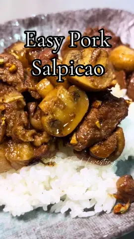 Easy Pork Salpicao Recipe | Pinoy Style Ingredients: 	•	1 kg pork kasim (cut into strips) 	•	¼ cup soy sauce 	•	¼ cup oyster sauce 	•	1 tbsp Worcestershire sauce 	•	½ tsp ground black pepper 	•	1 tsp smoked paprika 	•	Minced garlic (about 1 bulb or more) 	•	Garlic powder (optional) 	•	¼ cup butter 	•	2 bulbs garlic (for frying) 	•	2 cans whole mushrooms (halved) 	•	Coconut oil (for frying) 	•	Water as needed ⸻ Instructions: 	1.	Marinate: Combine pork, soy sauce, oyster sauce, Worcestershire sauce, pepper, smoked paprika, minced garlic, and garlic powder (optional). Marinate for at least 30 minutes or longer for better flavor. 	2.	Fry the Garlic: In a pan, heat oil and fry 2 bulbs of minced garlic until golden brown. Remove and set aside for topping. 	3.	Cook the Pork: In the same pan, add a bit of coconut oil and ¼ cup butter. Sauté the marinated pork until browned. Add a bit of water and simmer until tender. 	4.	Add Mushrooms: Stir in the halved mushrooms and the fried garlic. Simmer until the sauce reduces and oil starts to render. 	5.	Serve: Top with more fried garlic and serve hot with steamed rice #pork #Recipe #salpicao #yummy #Foodie   