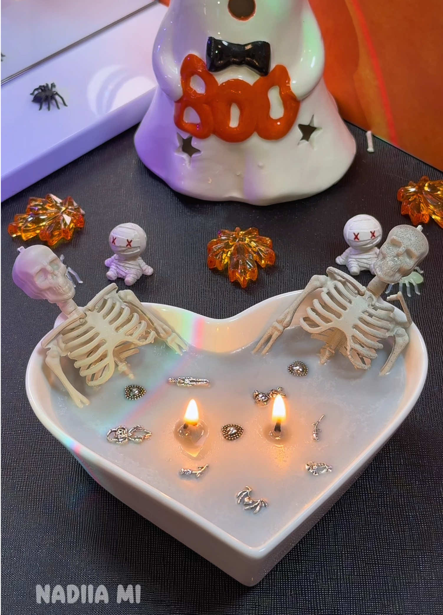 Two skeletons. One heart candle. Double flame 🔥 Halloween vibes + ASMR + cozy chaos 💀 #candletok #halloweendecor #craft #spookyseason #DIY 