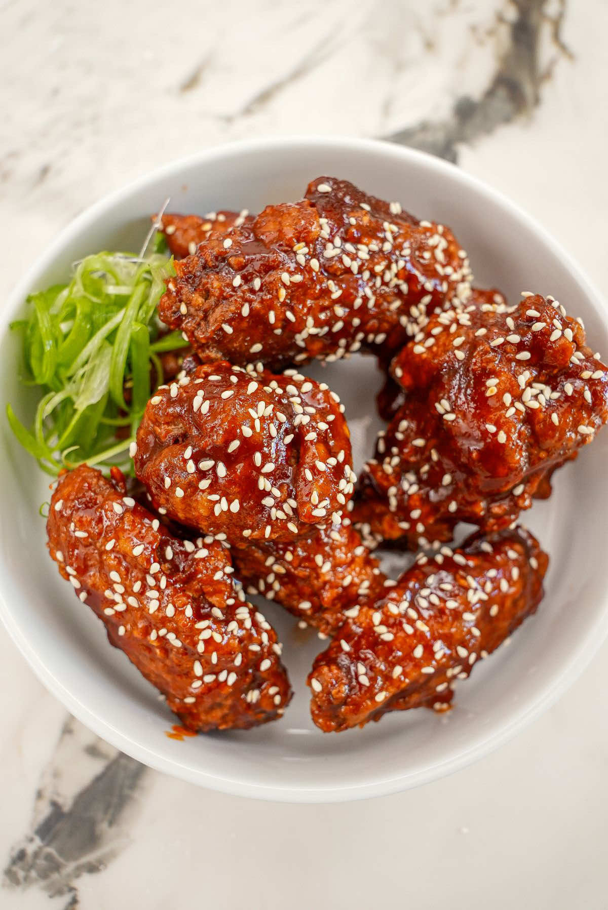 Wings that Always Win Episode 3: Gochujang Honey Wings!! These super crispy Korean fried chicken wings are one of my favorites - tossed in a sweet and spicy gochujang honey sauce! Comment “CJ Recipe” for the full recipe with all of my KEY tips sent straight to your inbox (make you follow me and your message requests are open to ensure you receive it)! https://cjeatsrecipes.com/gochujang-honey-wings/ #cjeatsrecipes #airfryer #chickenwings #koreanfriedchicken #EasyRecipes 